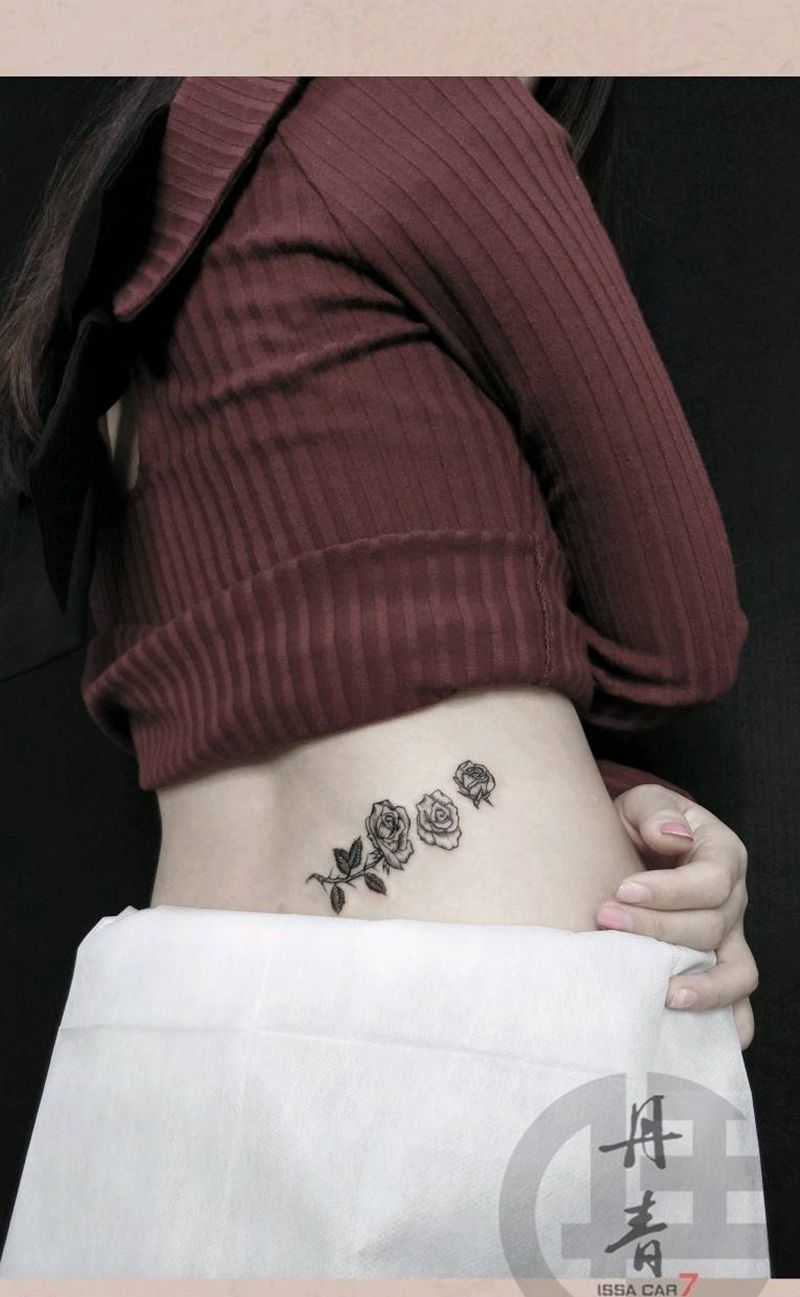 玫瑰纹身图片_腰部清新植物玫瑰成品纹身图案