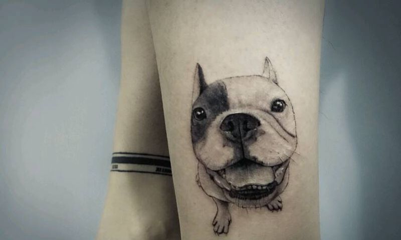 爱宠纹身图片_腿部写实动物狗成品纹身图案