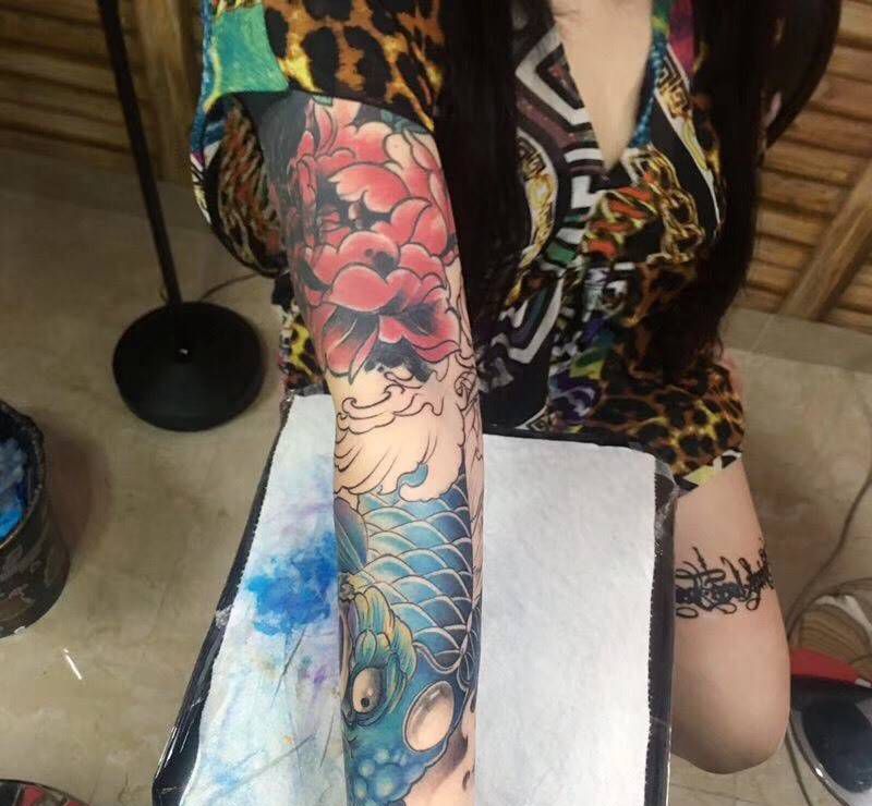 鱼纹身图片_成品手臂传统动物纹身图案