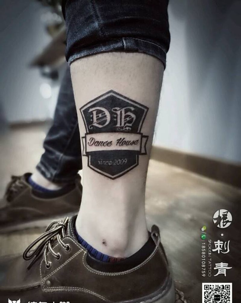 团队logo纹身图片_腿部传统几何图腾原创logo成品纹身图案