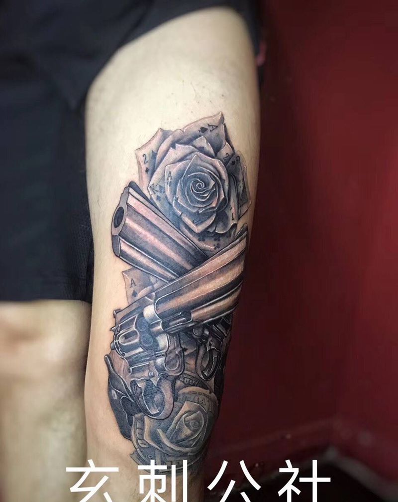 枪与玫瑰纹身图片