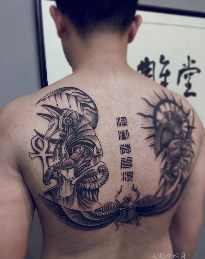 阿努比斯与荷鲁斯纹身图片_人物图腾宗教背部重庆重庆刺青义雕堂图案纹身图案