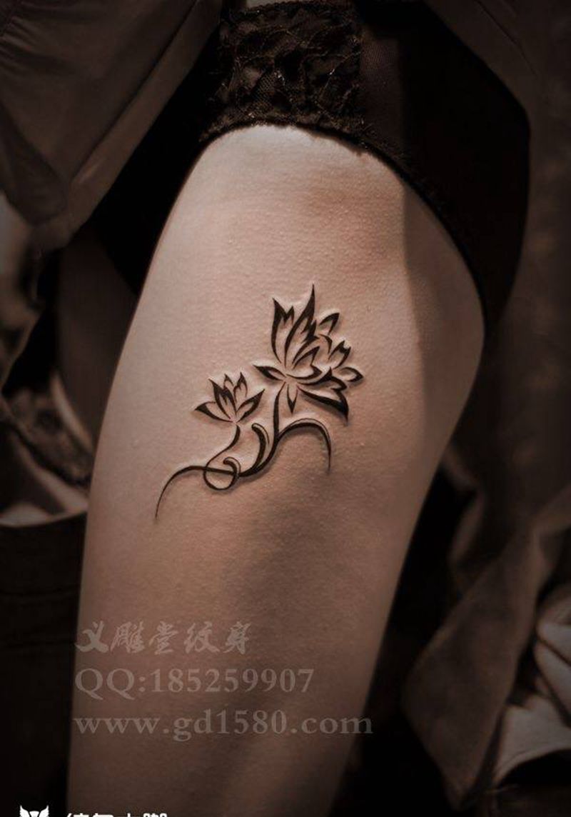 女人大腿刺青纹身图片_重庆图腾清新纹身图案