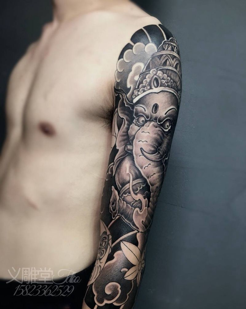 象神七分臂纹身纹身图片