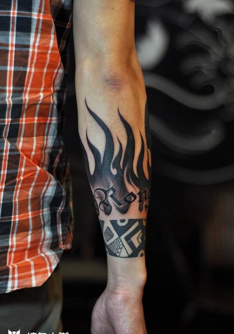 小手臂图腾纹身纹身图片_图腾手臂重庆纹身图案