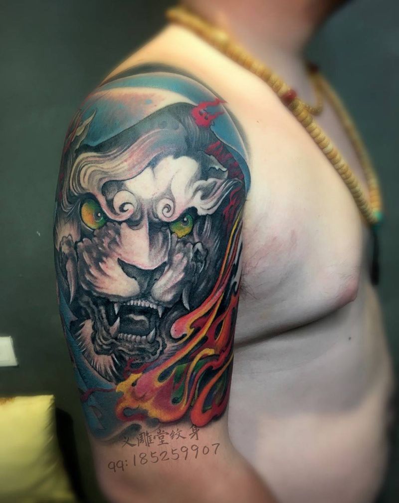 狮子头纹身纹身图片_手臂传统动物重庆纹身图案