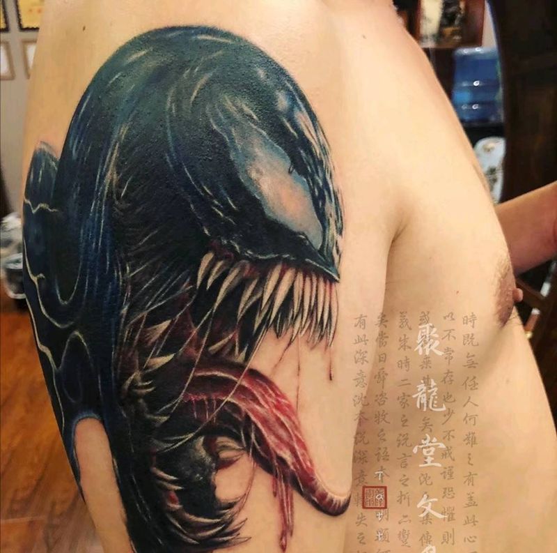 毒液纹身图片_手臂欧美写实纹身图案