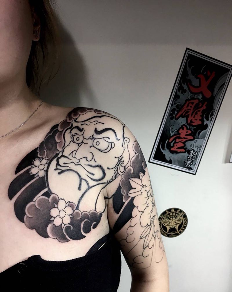 达摩牡丹花半胛纹身图片_老传统重庆义雕堂刺青纹身图案