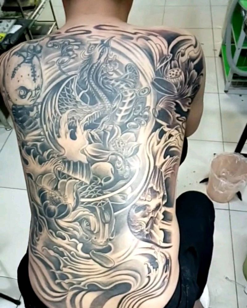 大满背富贵有余凤凰鲤鱼纹身图片