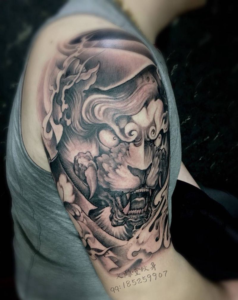 大臂狮子纹身纹身图片_手臂传统动物重庆纹身图案