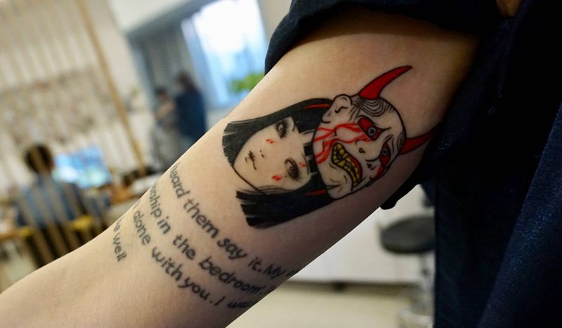 富江纹身图片_手臂水彩纹身图案