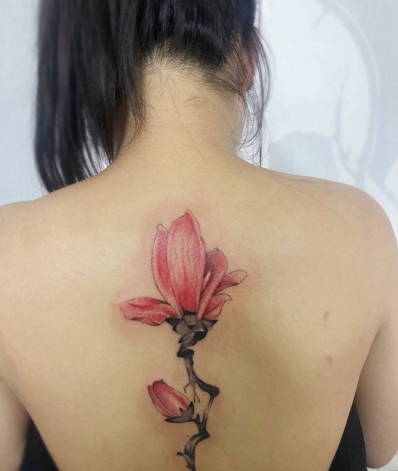 郁兰花纹身图片_背部水墨花纹身图案