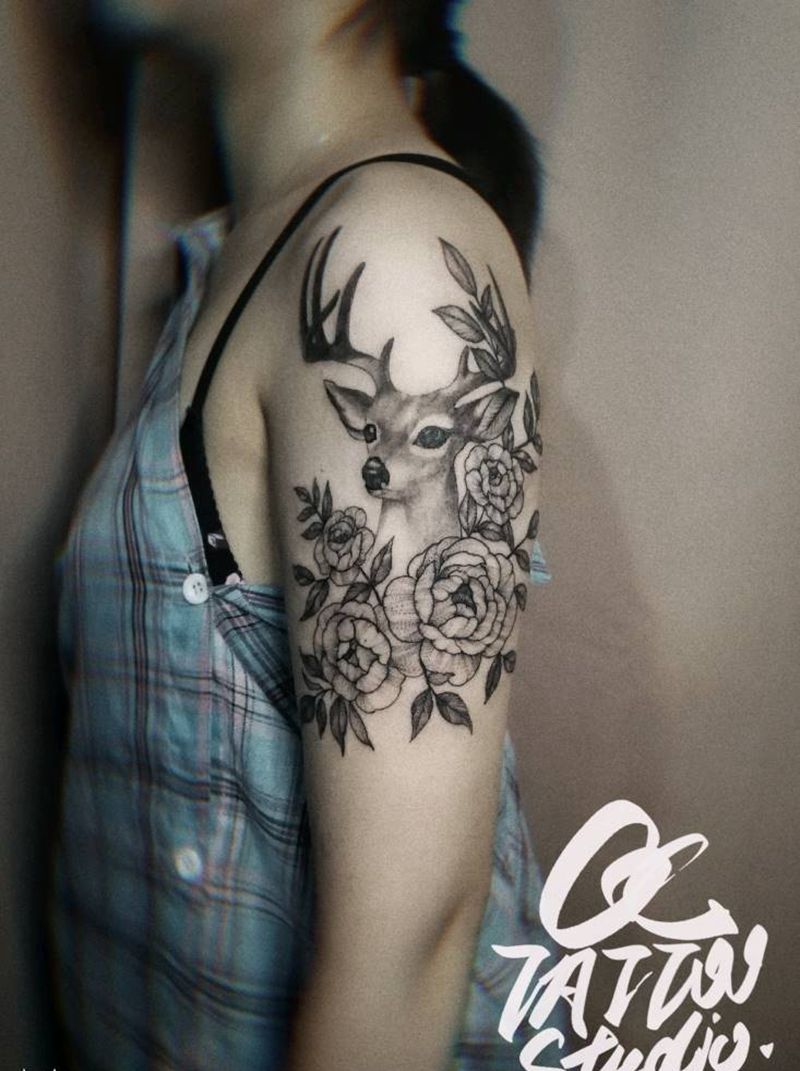 鹿纹身图片_手臂点刺纹身图案