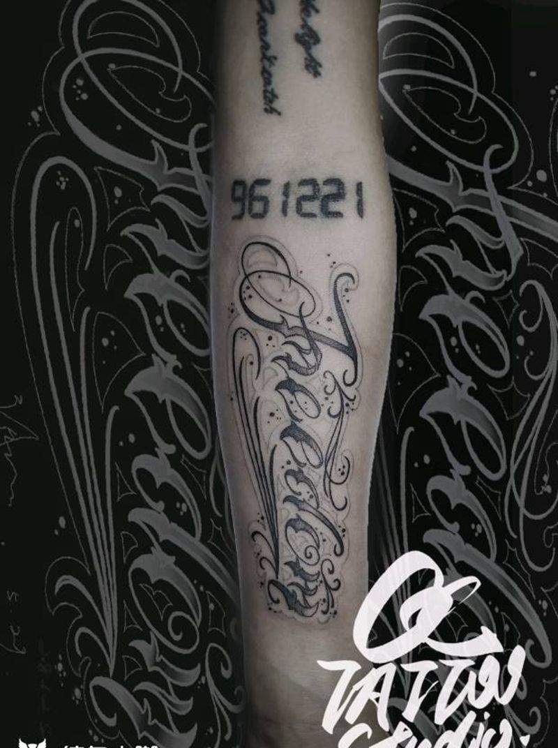 花体纹身图片_手臂花体字纹身图案