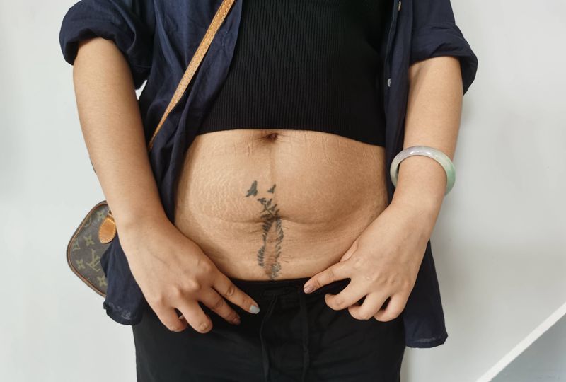 遮盖纹身图片_腹部纹身图案