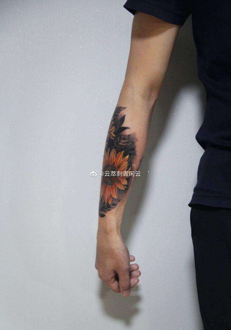 太阳花纹身图片_手臂纹身图案