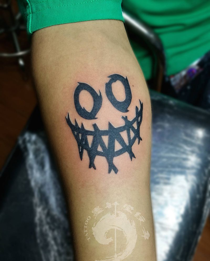 小丑笑脸纹身图片_手部手臂图腾几何纹身图案