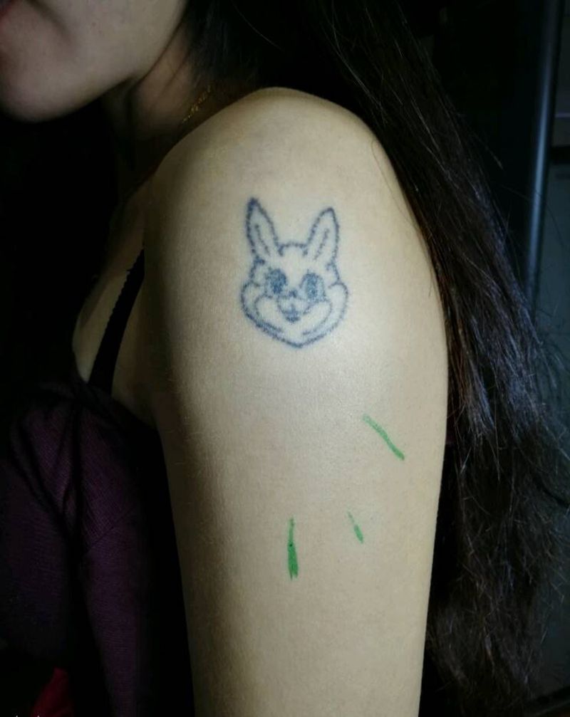 玫瑰花遮盖以前的兔兔纹身图片