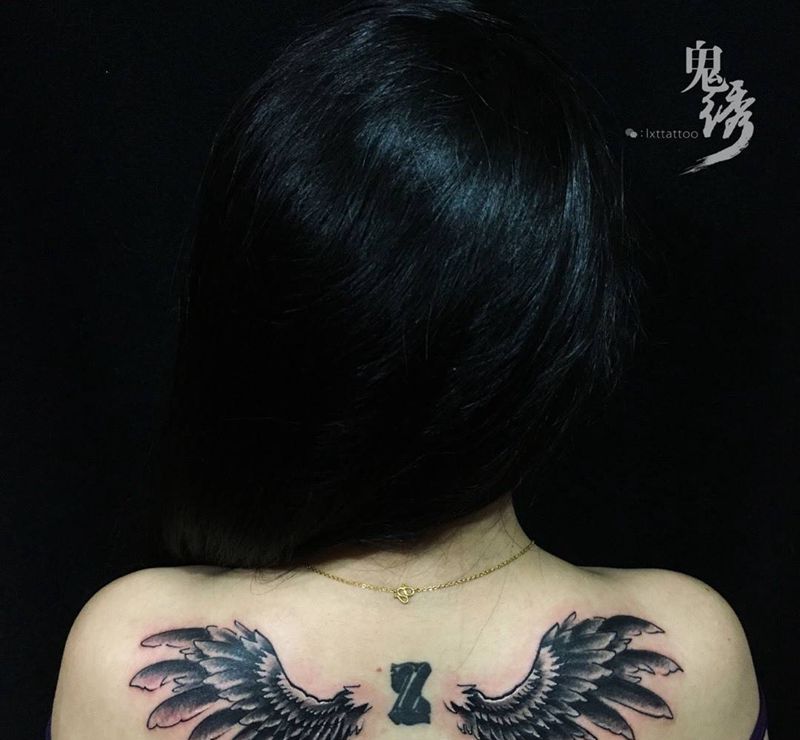 天使翅膀纹身图片_成品背部清新静物刺青纹身图案