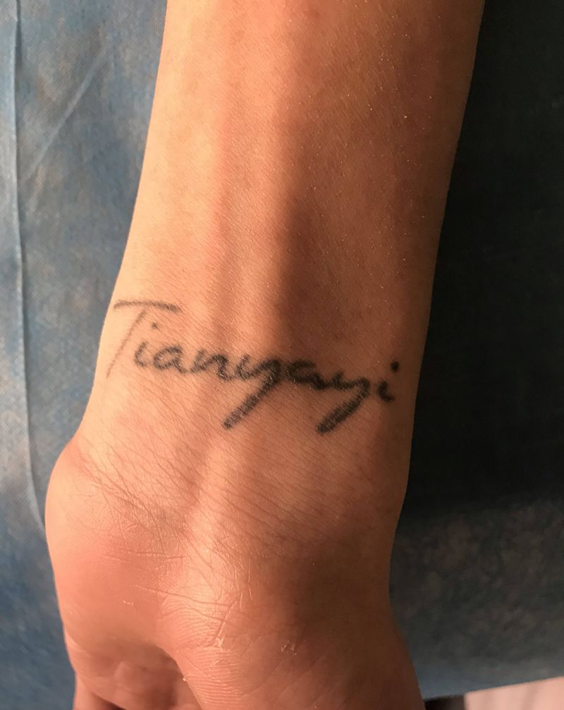 洗纹身图片_手部纹身图案