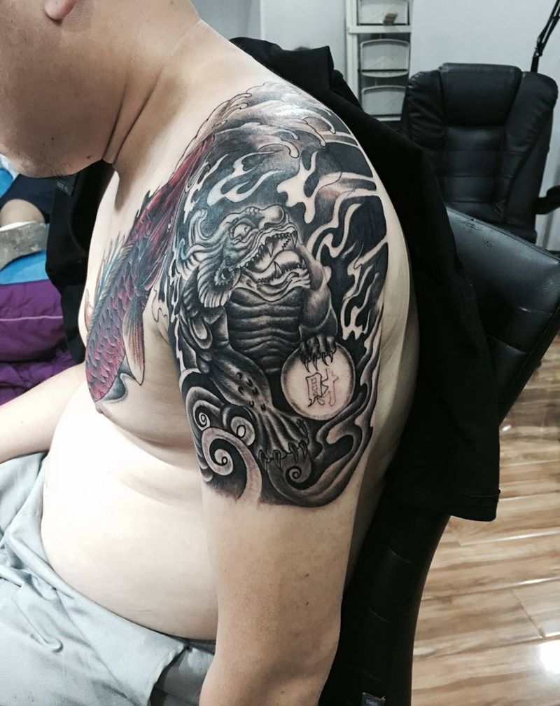 大臂神兽纹身图片