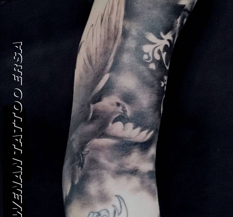 鸽子纹身图片_手臂欧美写实纹身图案