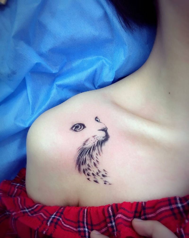 猫咪纹身图片_胸部动物纹身图案