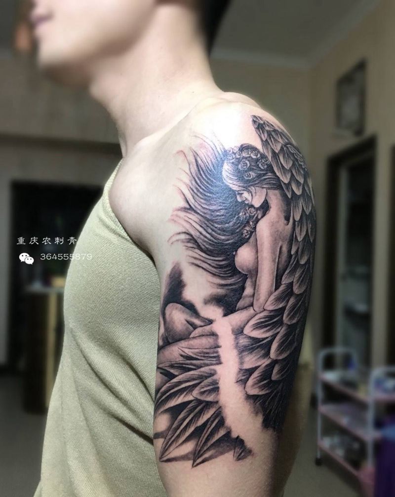 天使遮盖旧纹身纹身图片_肩部手臂新传统欧美写实天使纹身图案