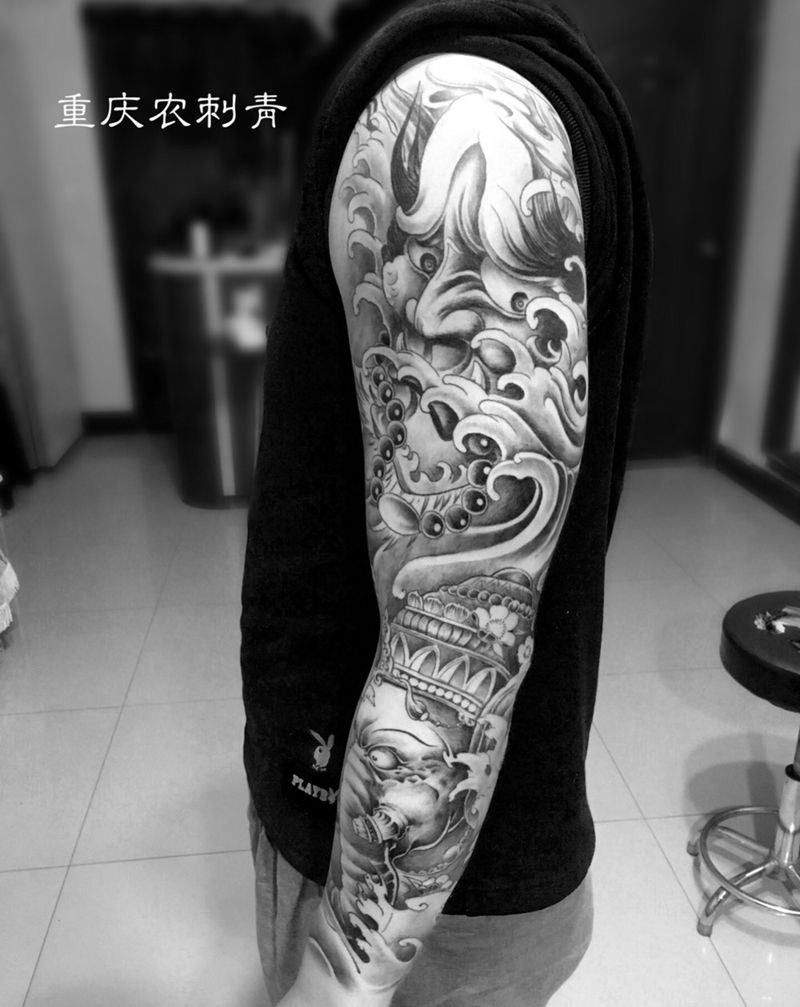 般若象神花臂纹身图片_手部手臂新传统象神般若浪花纹身图案