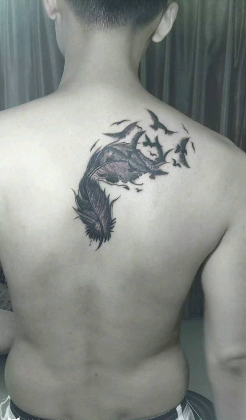 后背羽毛纹身图片