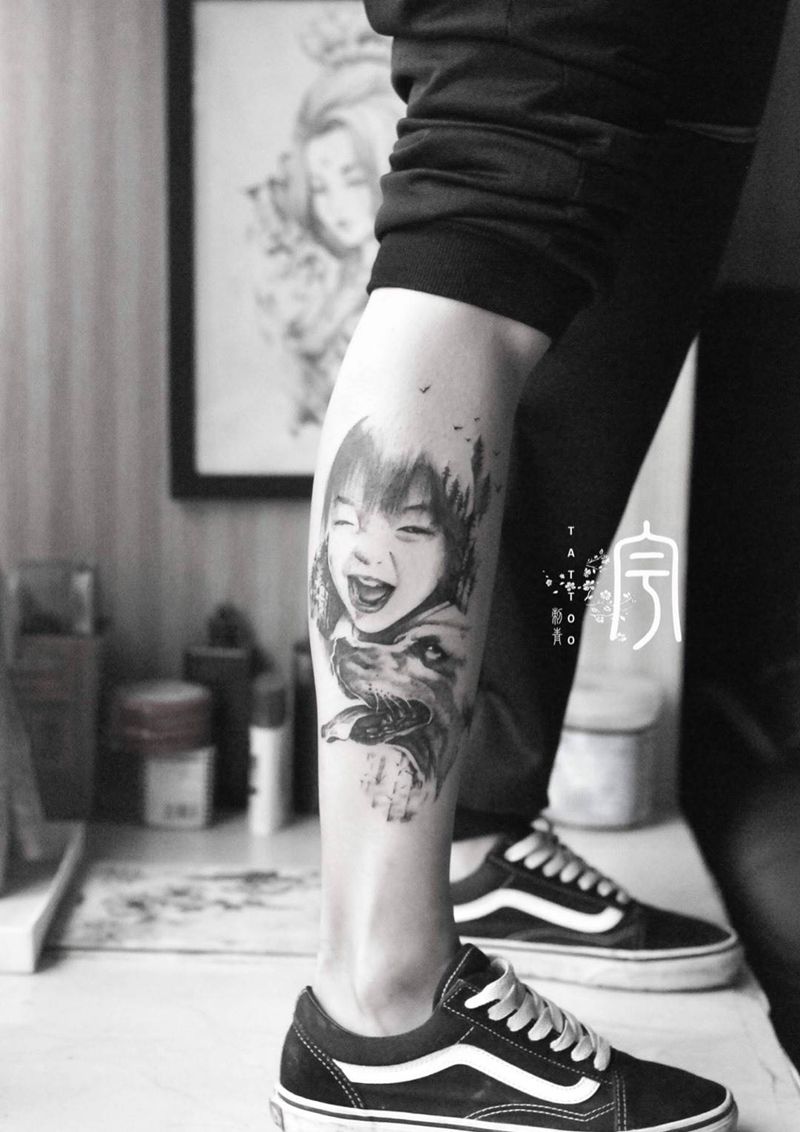 肖像纹身图片_成品腿部写实肖像原创纹身图案