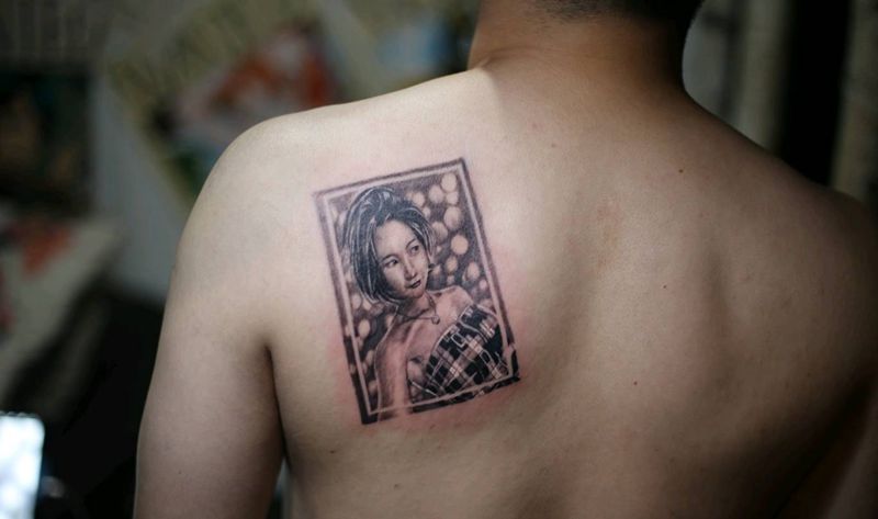 无纹身图片_背部欧美写实纹身图案