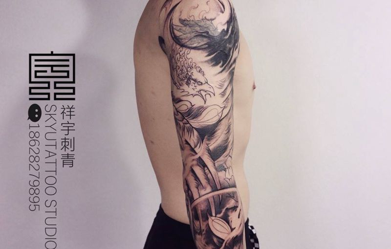 凤凰涅槃纹身图片_手臂新传统凤凰纹身图案