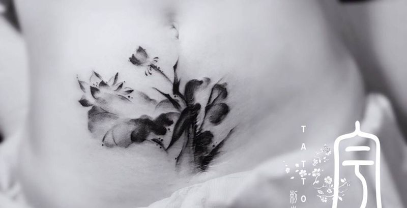 疤痕遮盖纹身图片_成品腹部传统国画植物纹身图案