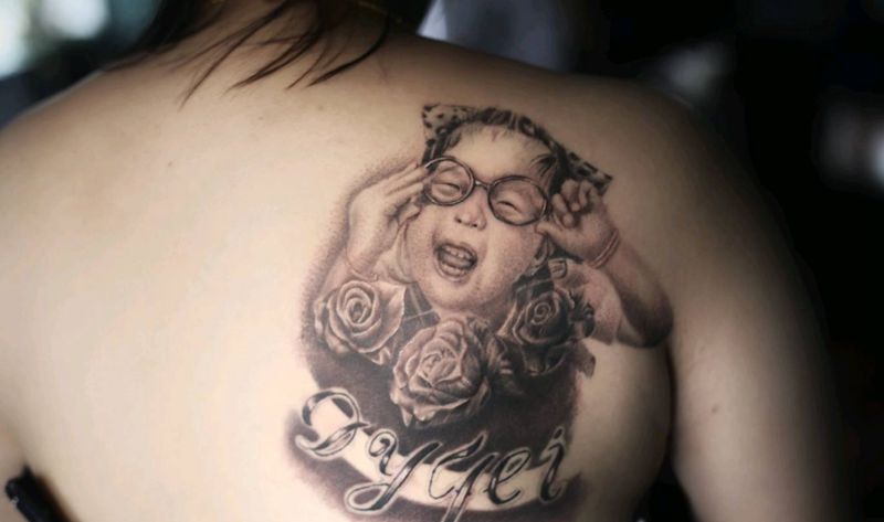 肖像纹身图片_背部纹身图案