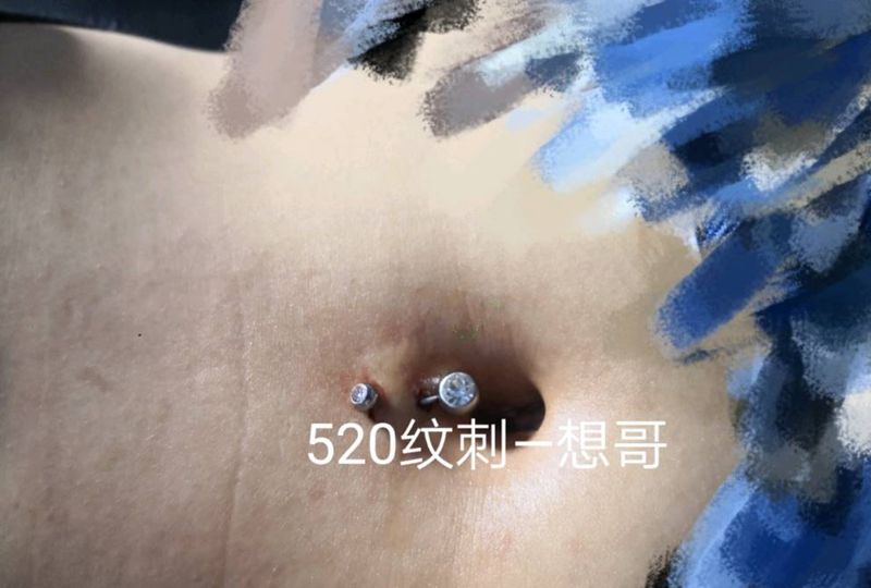 穿孔肚脐纹身图片_腹部纹身图案