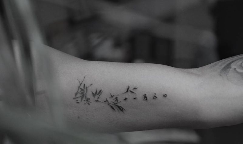 文字纹身图片_手臂水墨水墨文字纹身图案