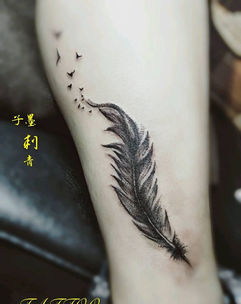 羽毛纹身图片_腿部欧美写实羽毛，鸟纹身图案