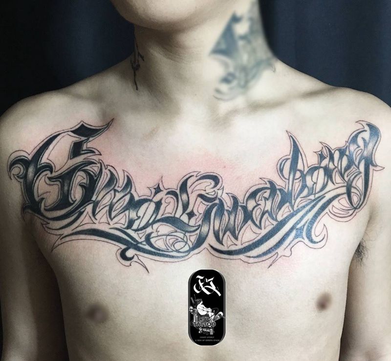 奇卡诺花体字纹身图片_胸部花体字纹身图案