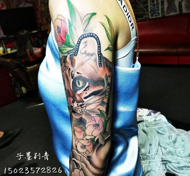 修改的一条花臂纹身图片