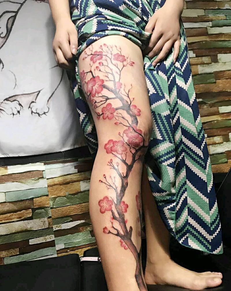 一腿梅花纹身图片
