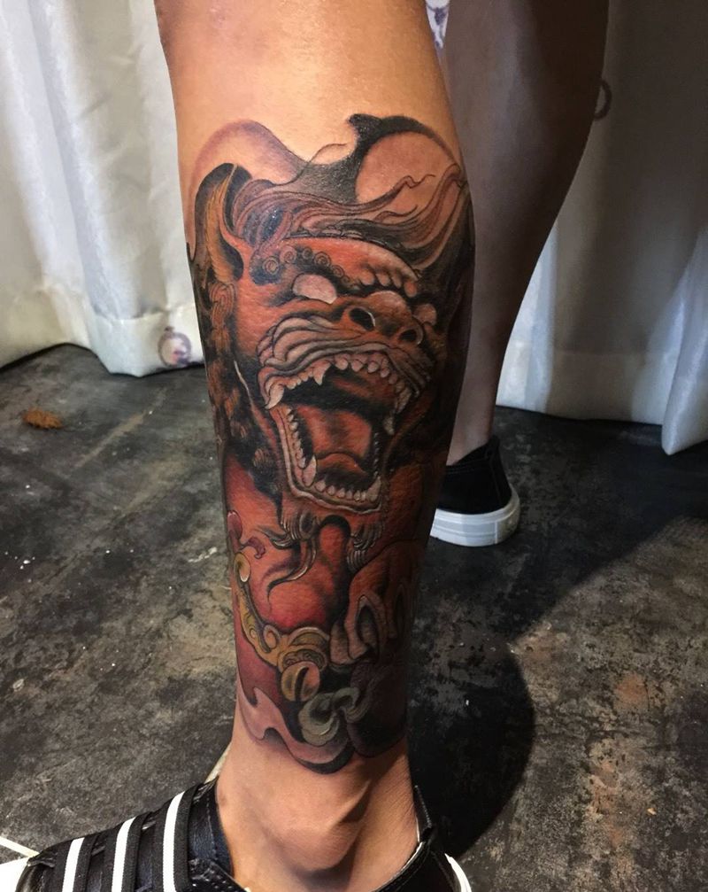 福狮纹身图片_成品腿部传统纹身图案