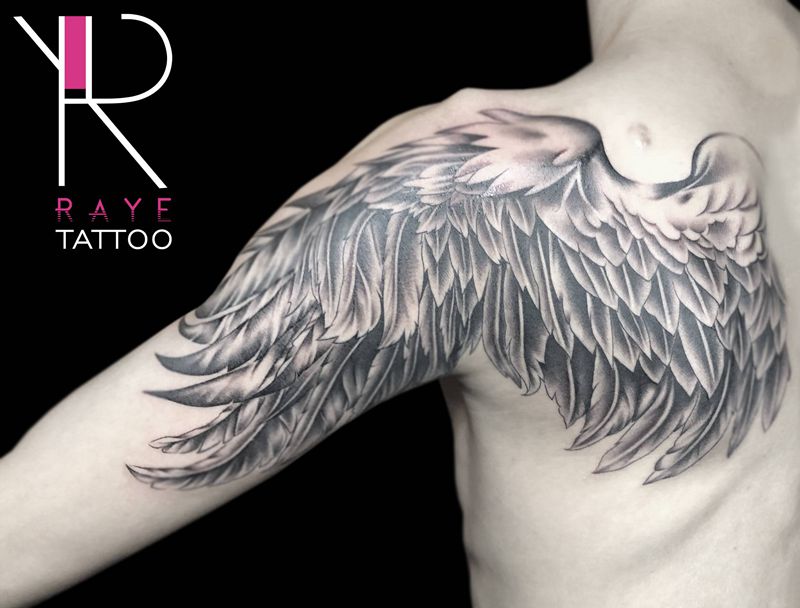 翅膀纹身图片_手臂欧美写实纹身图案