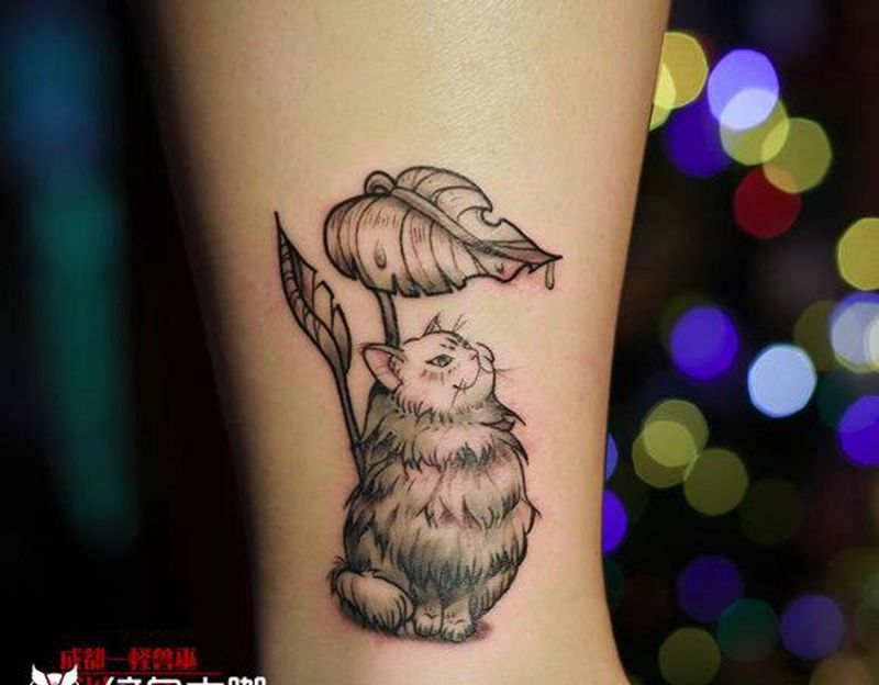 小猫纹身图片_腿部纹身图案