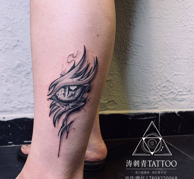 眼纹身图片_腿部纹身图案