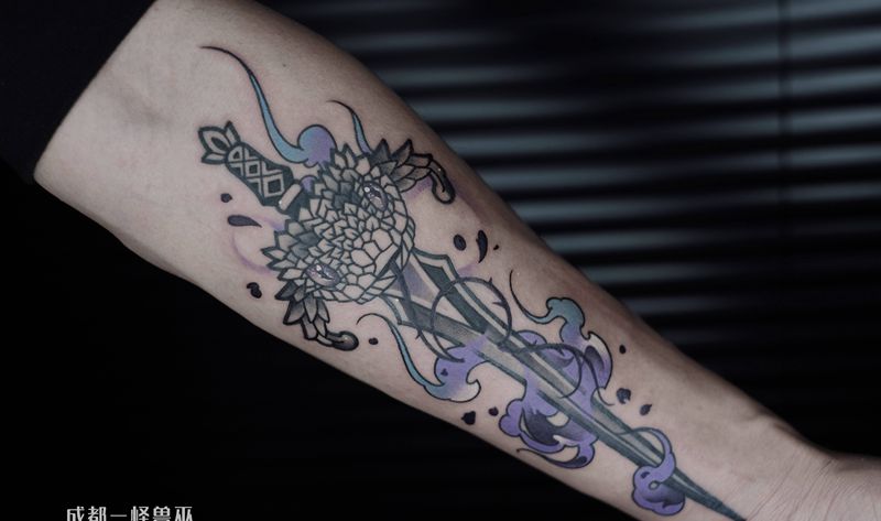 蝰蛇与剑纹身图片_手臂New School纹身图案