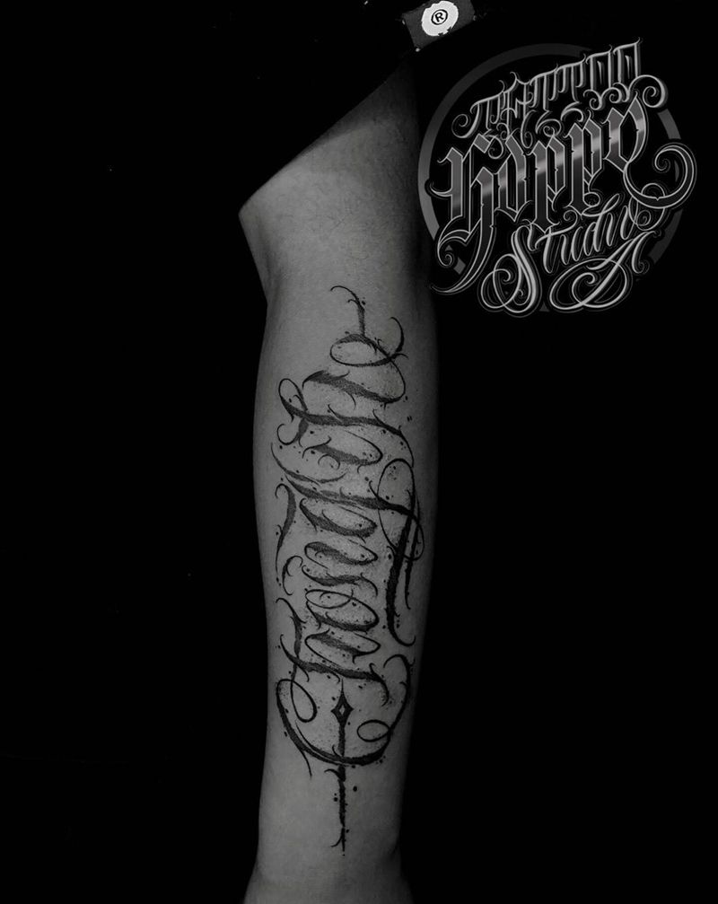 花体字纹身图片_手臂花体字纹身图案