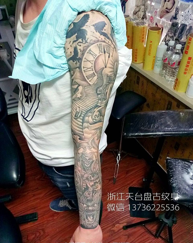 花臂纹身图片_手臂手部传统天台盘古成品纹身图案