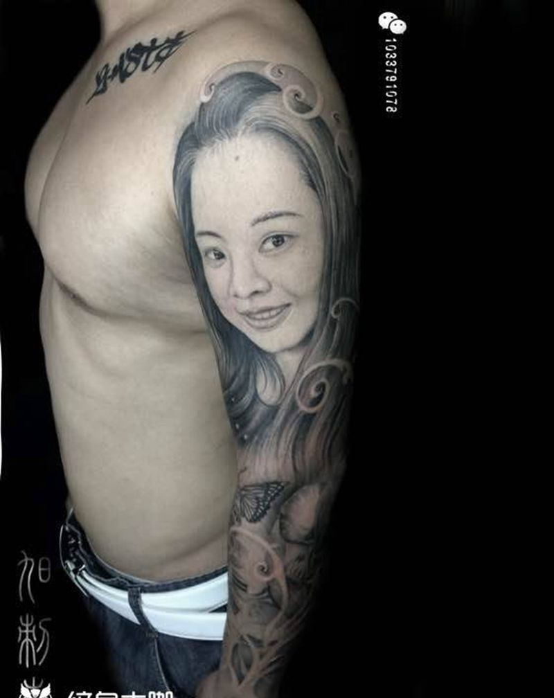 肖像花臂纹身图片_成品手臂写实人物纹身图案