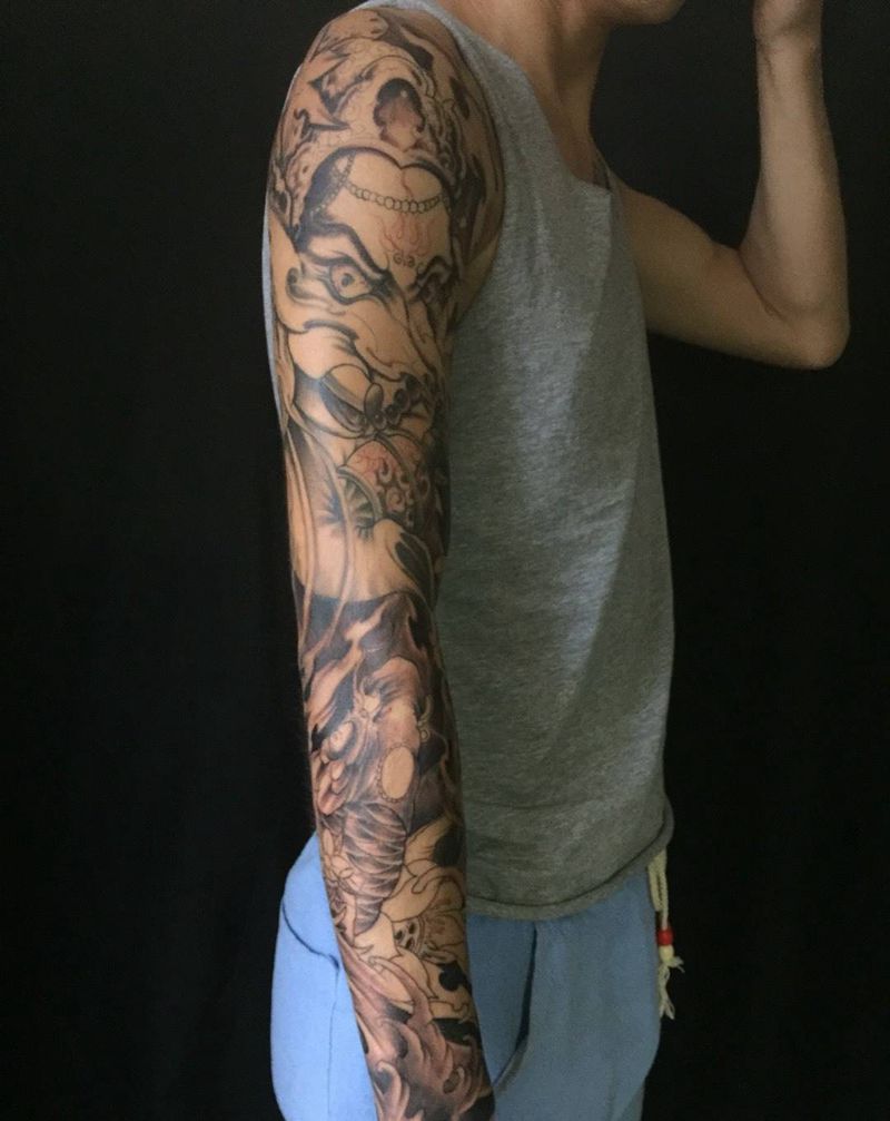 彩色花臂黑灰完成彩色待续纹身图片_成品手臂传统刺青纹身图案